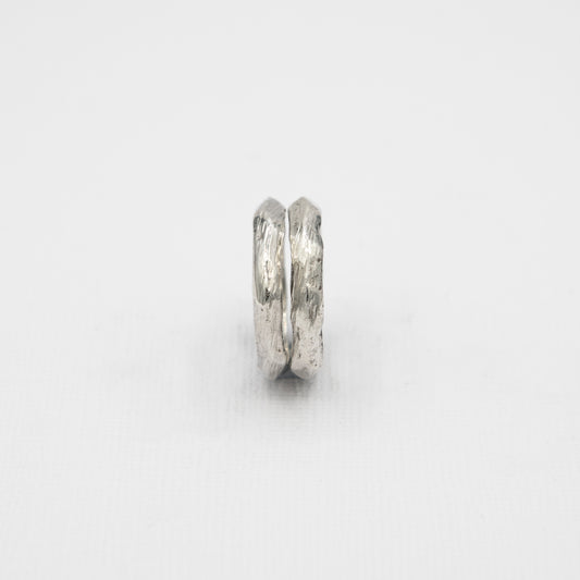 A sleek and minimalist men's stacking ring in solid 925 silver, perfect for surf-inspired style and layering.