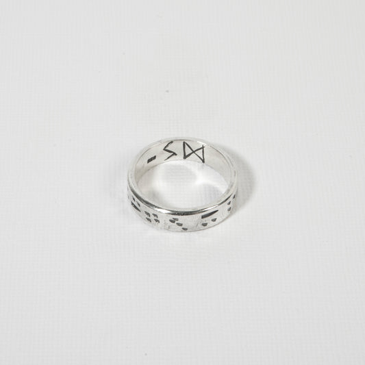 Minimalist yet bold men’s sterling silver surf ring, perfect for ocean lovers and adventurers.