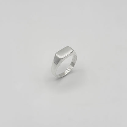 Silver ring on a white background