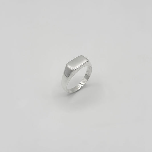 Silver ring on a white background