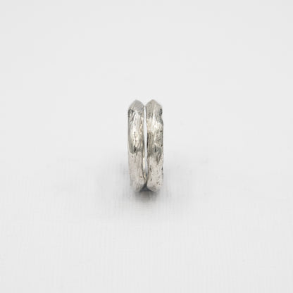 A sleek and minimalist men's stacking ring in solid 925 silver, perfect for surf-inspired style and layering.