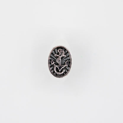 Bold and timeless, this nautical anchor signet ring is the perfect statement piece for ocean lovers.