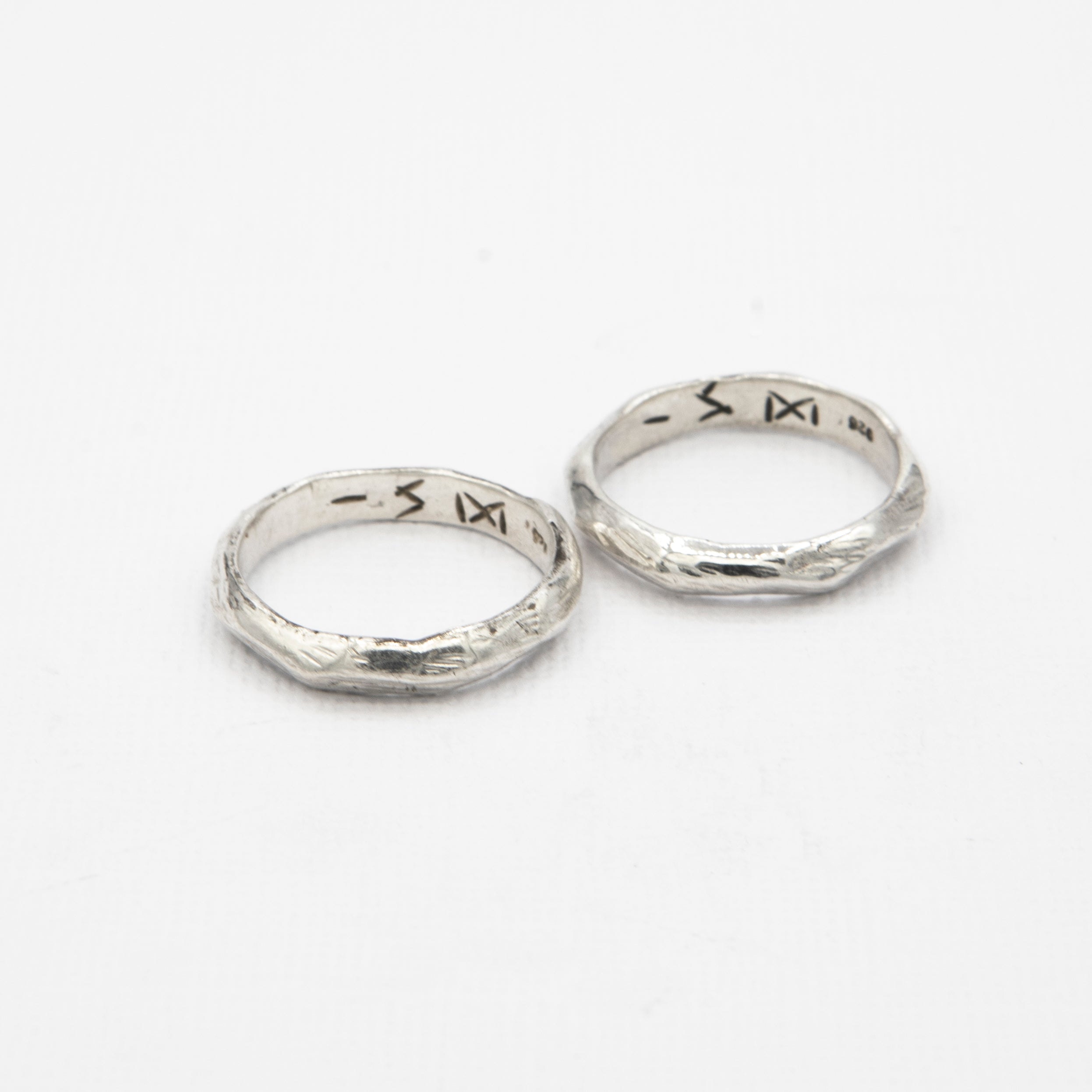 Crafted for modern men, this sterling silver stacker ring adds a refined, understated edge to any look.