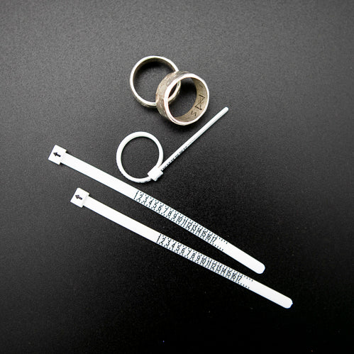 An easy-to-use adjustable ring sizer for measuring your correct ring size before purchasing.