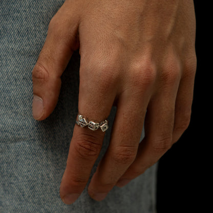 Handmade sterling silver dice ring with detailed engravings, crafted for risk-takers and ocean explorers